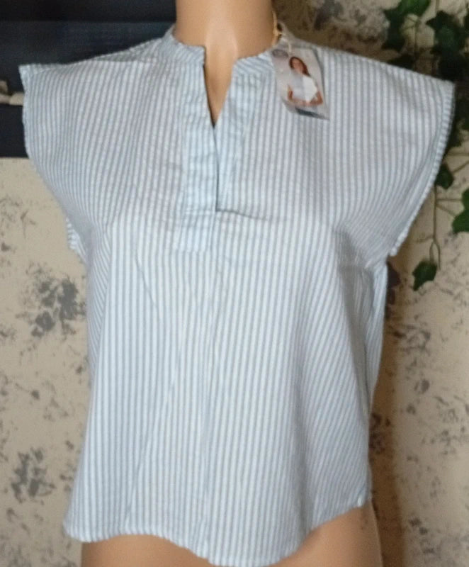 Blusa sin mangas rayas azul y blanco
