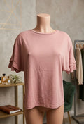 Camiseta rosa manga corta volantes