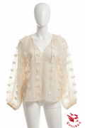Blusa romántica en tejido vaporoso