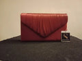 Bolso clutch de noche raso rojo burdeos