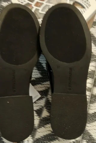 Mocasines Stradivarius negros tachuelas
