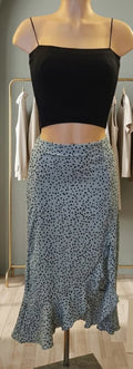 Mint green midi skirt with black polka dots